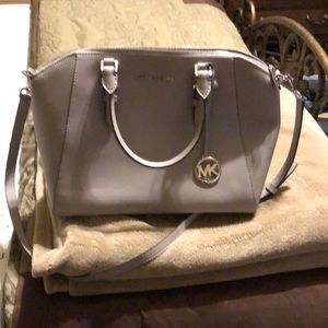 Beautiful gray Saffiano leather bag . Silver trim.